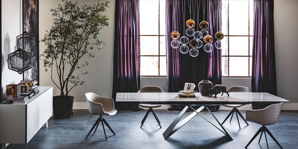 A modern dining room table and matching chairs designed by San Francisco Design