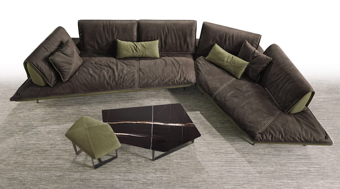 Modern Leather sectional natural stone table linen pillows and rug