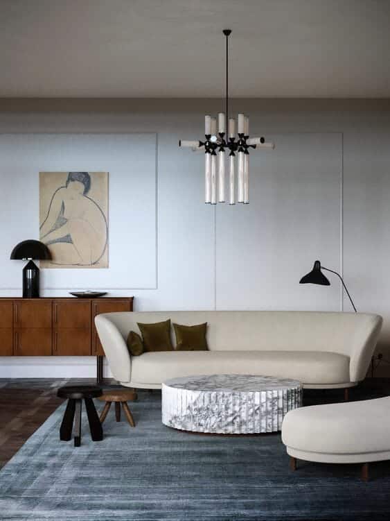 Contemporary living room design with sofa, coffee table and chandelier