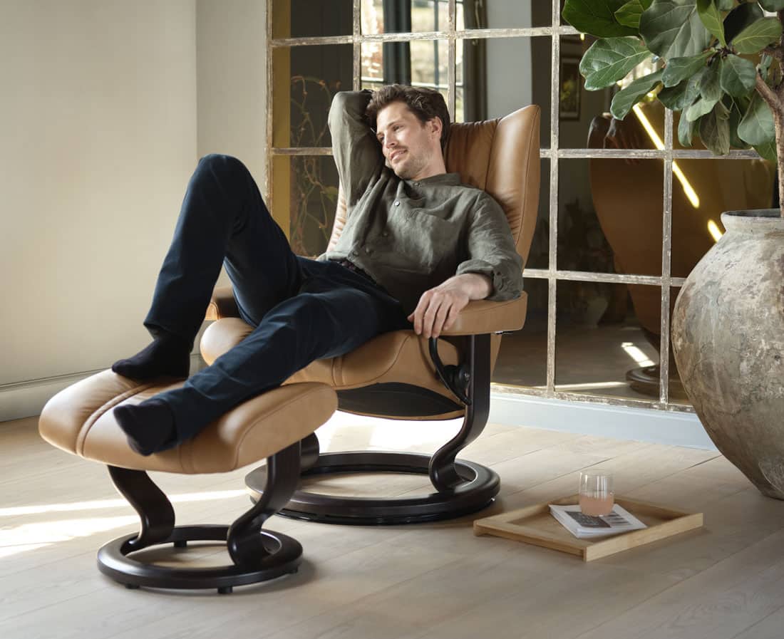Man Relaxing in leather Stressless chair