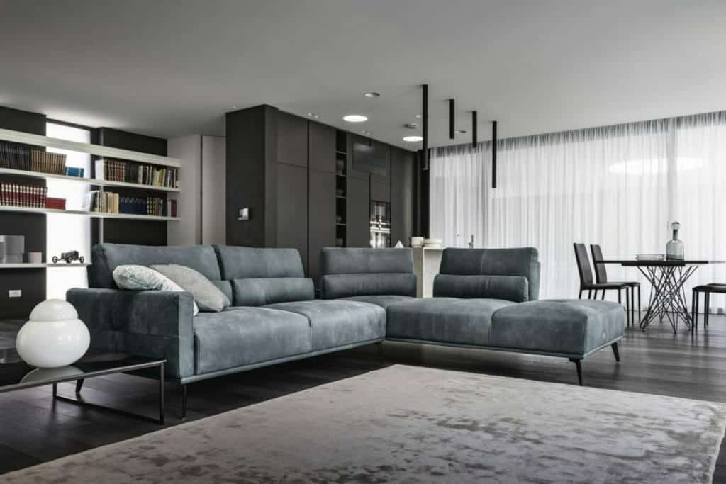 Blue sofa as a focal point in a contemporary & modern living room